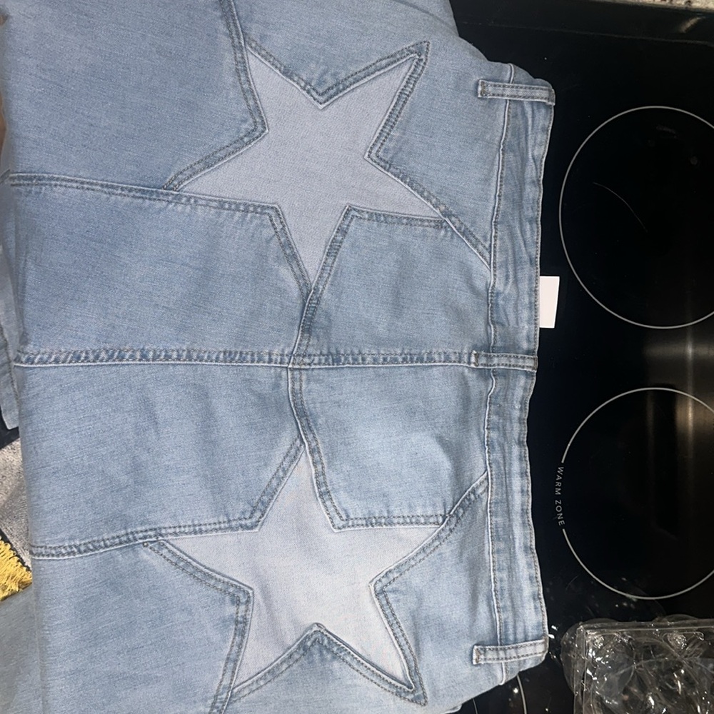 NWT arula high waisted light wash bell bottom flare jeans star